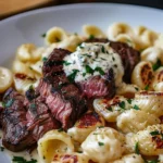 Steak Bites and Shell Pasta in Garlic Butter Alfredo Sauce